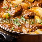 Beef stew in a slow cooker with potatoes